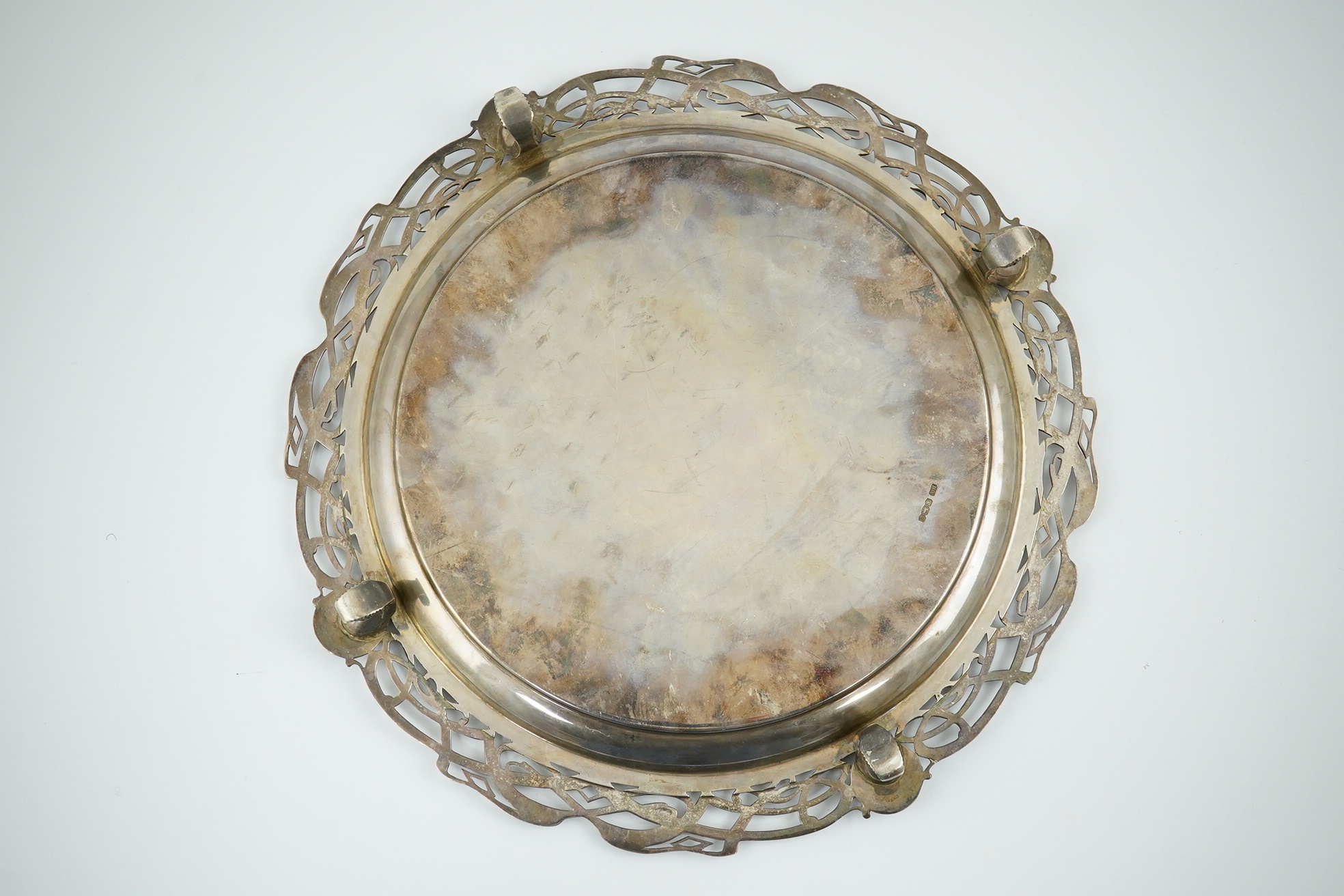 A George V silver salver with pierced Celtic border, by Atkin Brothers